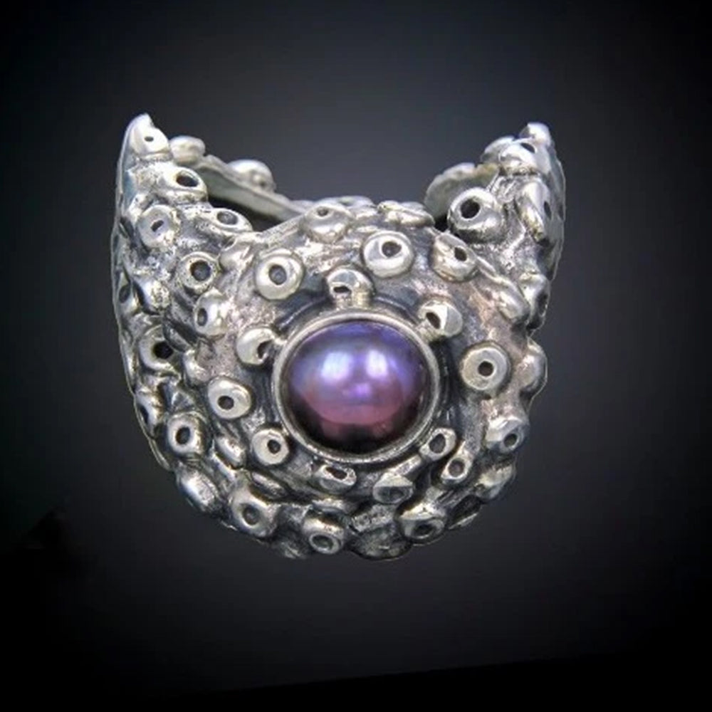 
                      
                        Tentacle Stoned Ring
                      
                    