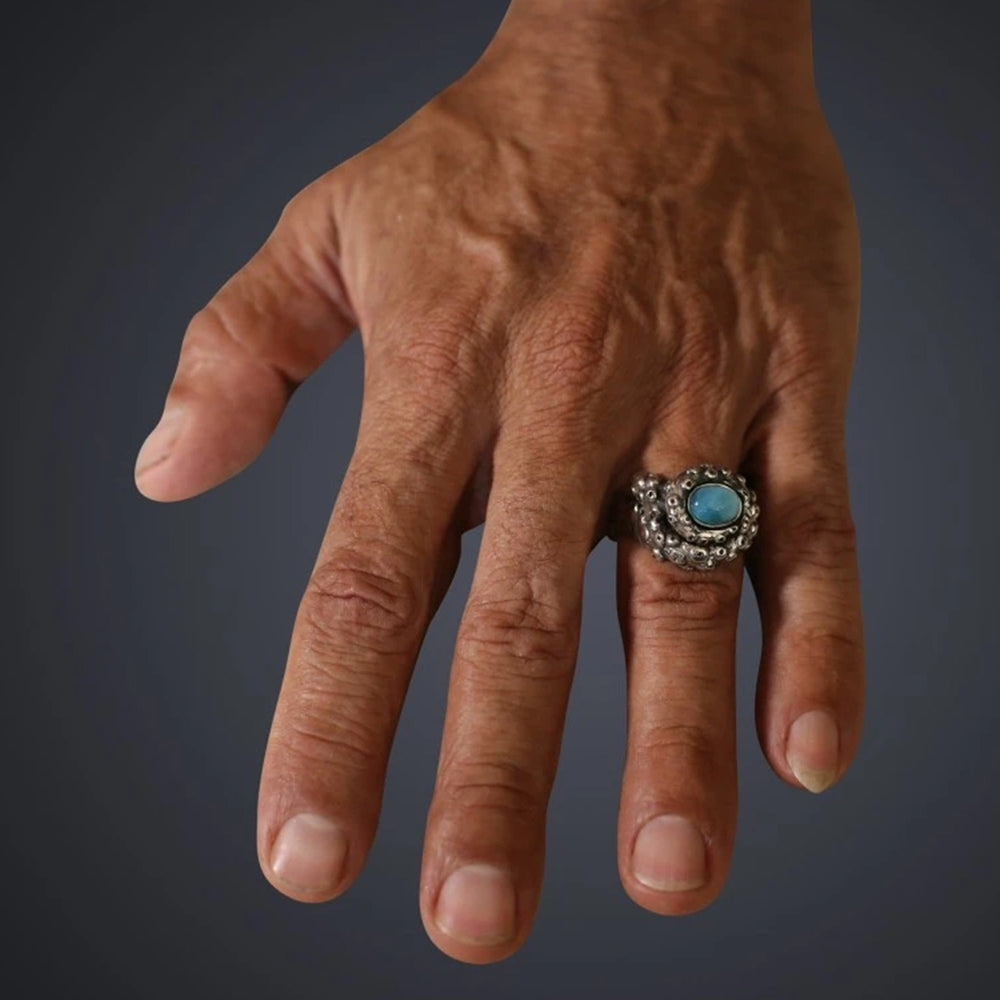 
                      
                        Tentacle Stoned Ring with Larimar
                      
                    