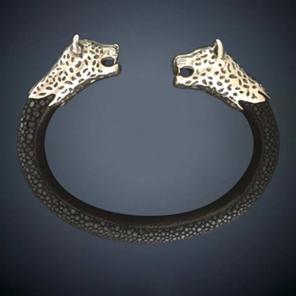 
                      
                        Jaguar Cuff
                      
                    